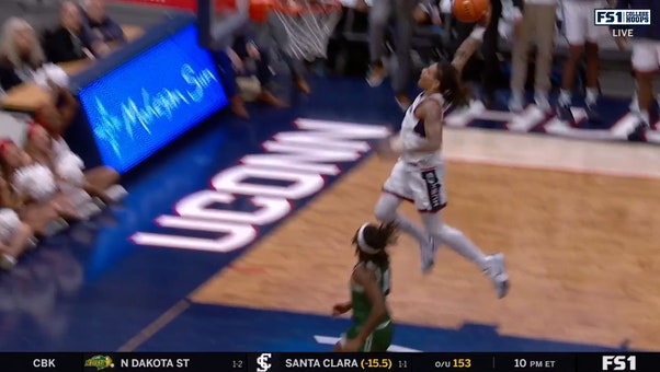 Solomon Ball intercepts pass and throws down a TOMAHAWK slam to extend UConn's lead over Le Moyne